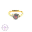 18kt Yellow Gold 1 Black Opal and 6 diamond ring