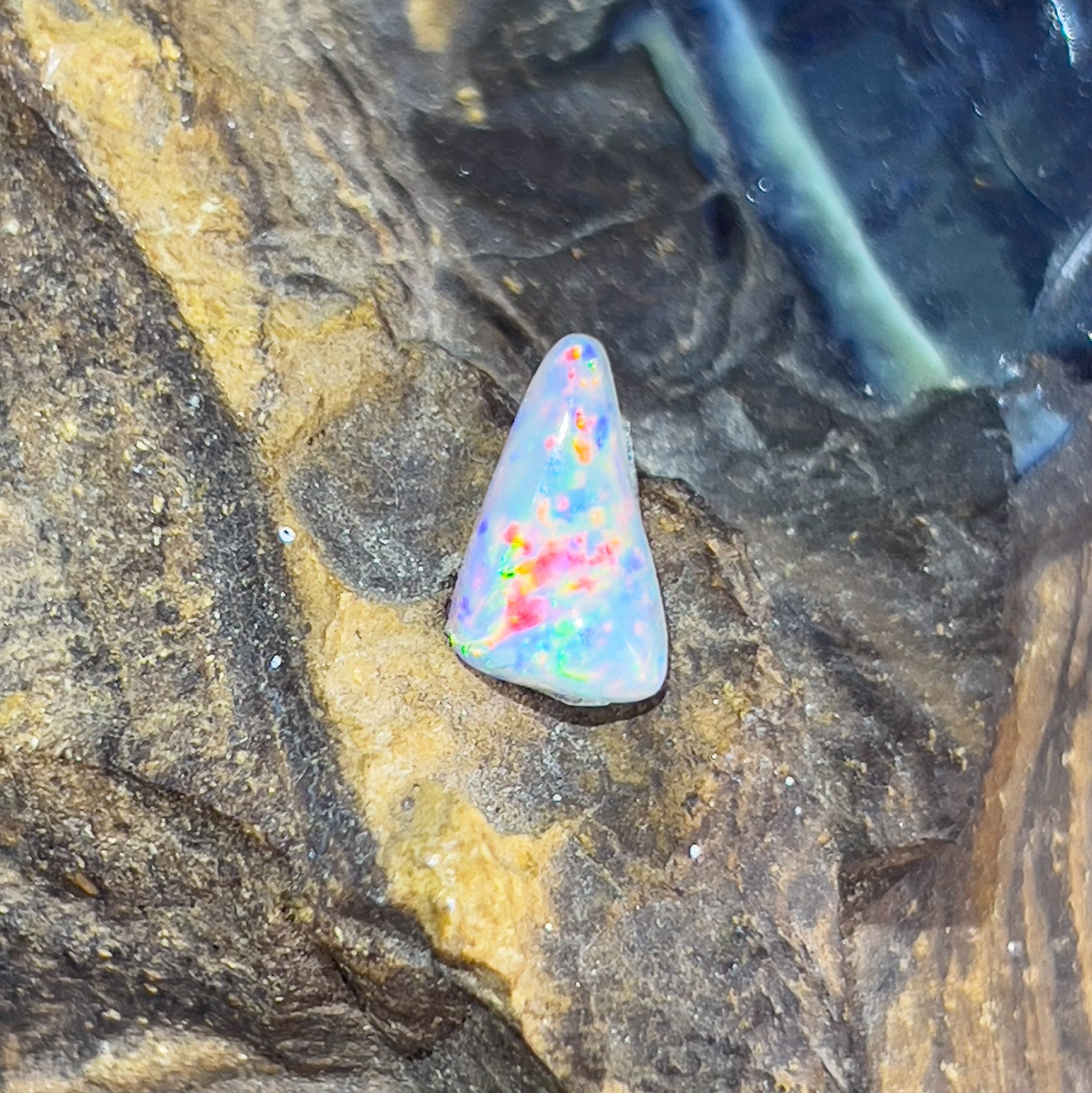 Loose triangular shape 1.35ct Red Fiery Yellow Green Light Opal - Masterpiece Jewellery Opal & Gems Sydney Australia | Online Shop