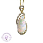 18kt Yellow Gold 4.72ct Freeform Crystal Opal and diamond pendant