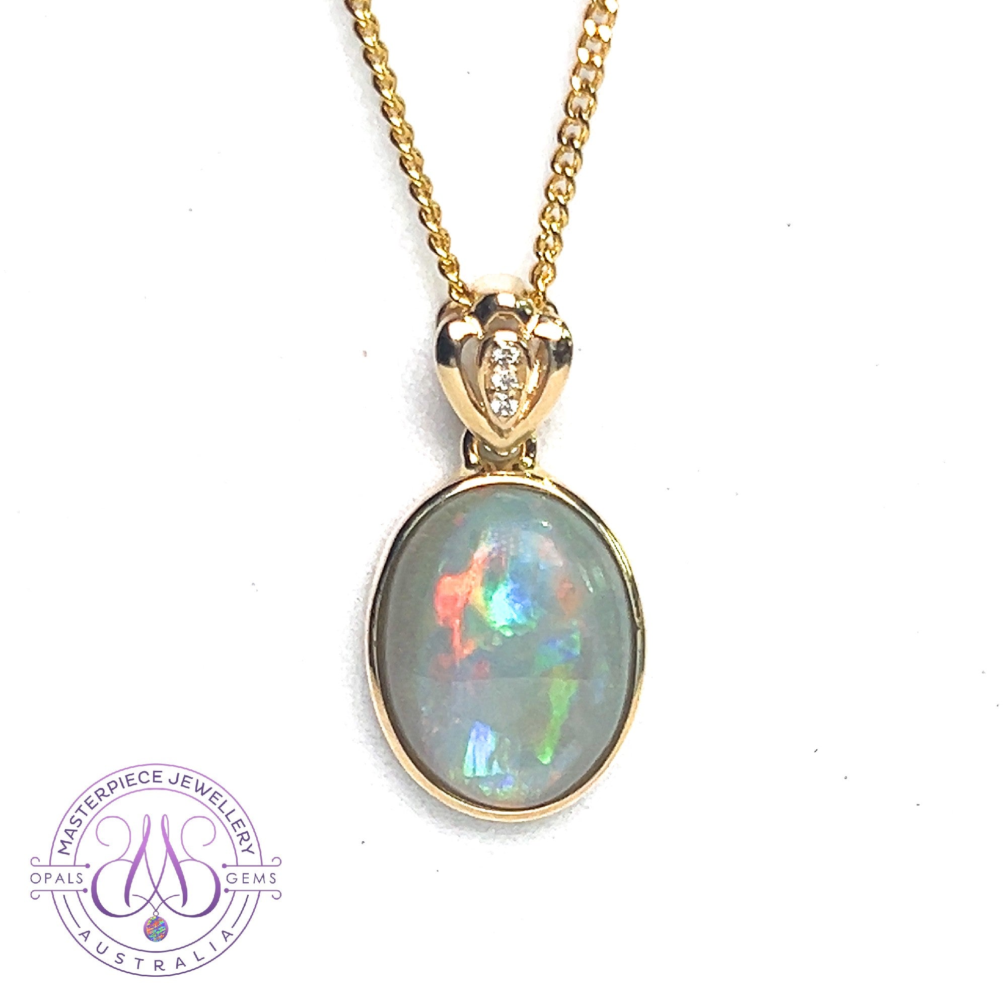 14kt Yellow Gold Black Opal 3.84ct and Diamond pendant