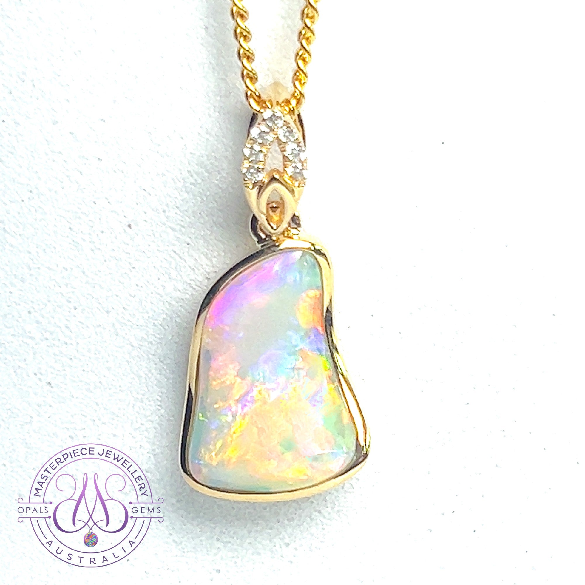 14kt Yellow Gold freeform Crystal Opal 1.5ct and diamond pendant