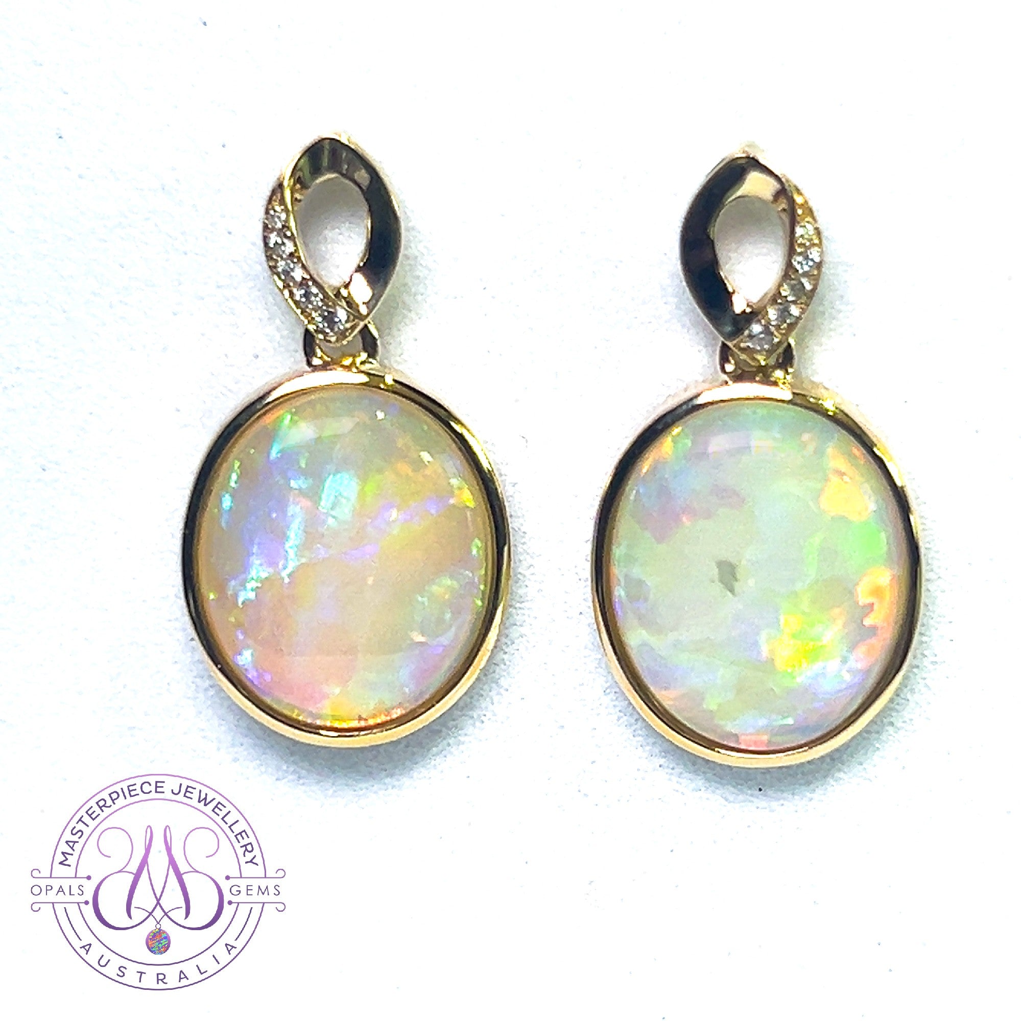 14kt Yellow Gold dangling Oval Opal earrings 5.1ct