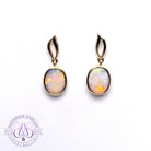 14kt Yellow Gold dangling Oval shape earrings