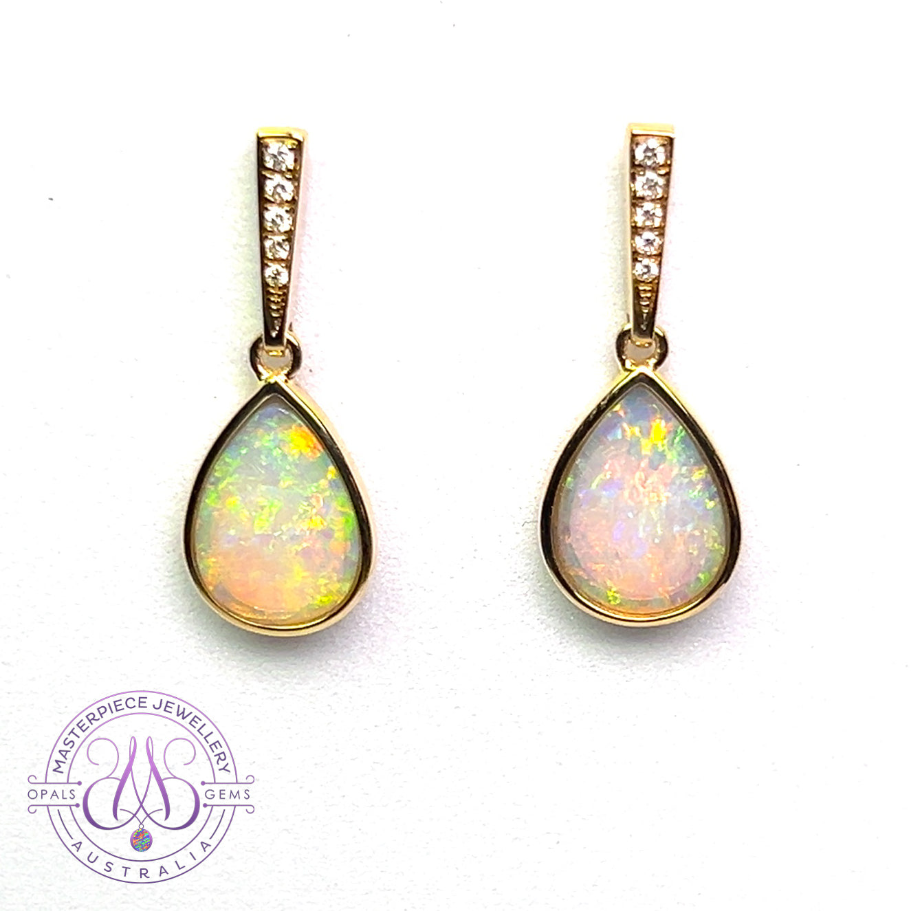 14kt Yellow Gold dangling Pear shape Crystal Opals 0.88ct earrings