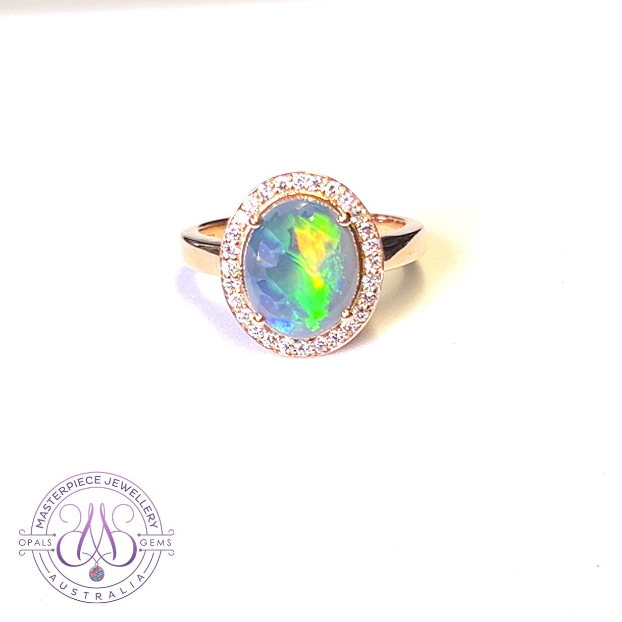 18kt Rose Gold Black Opal 2.13ct Light pink diamonds 0.28ct halo ring