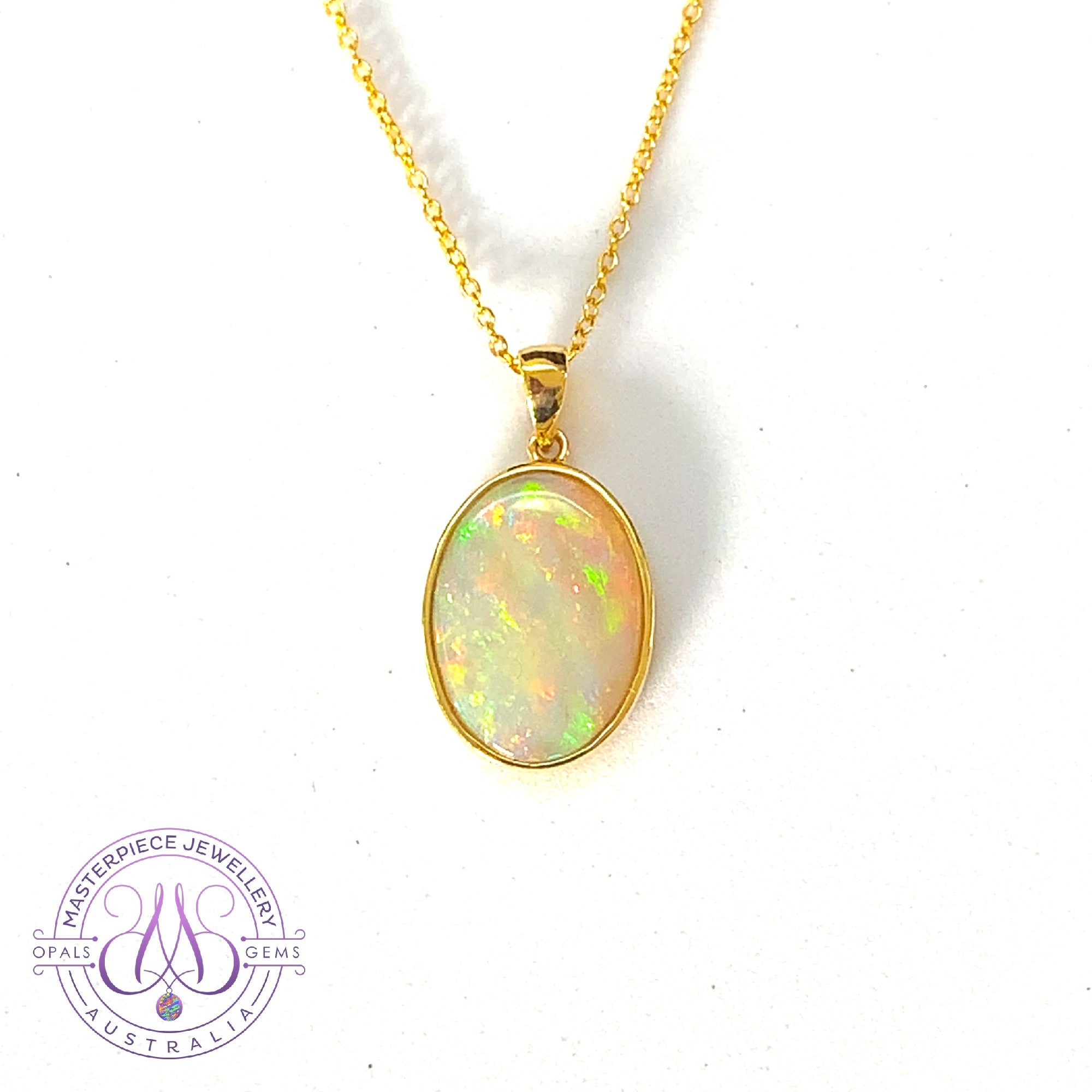 18kt Yellow Gold bezel set Oval Opal pendant