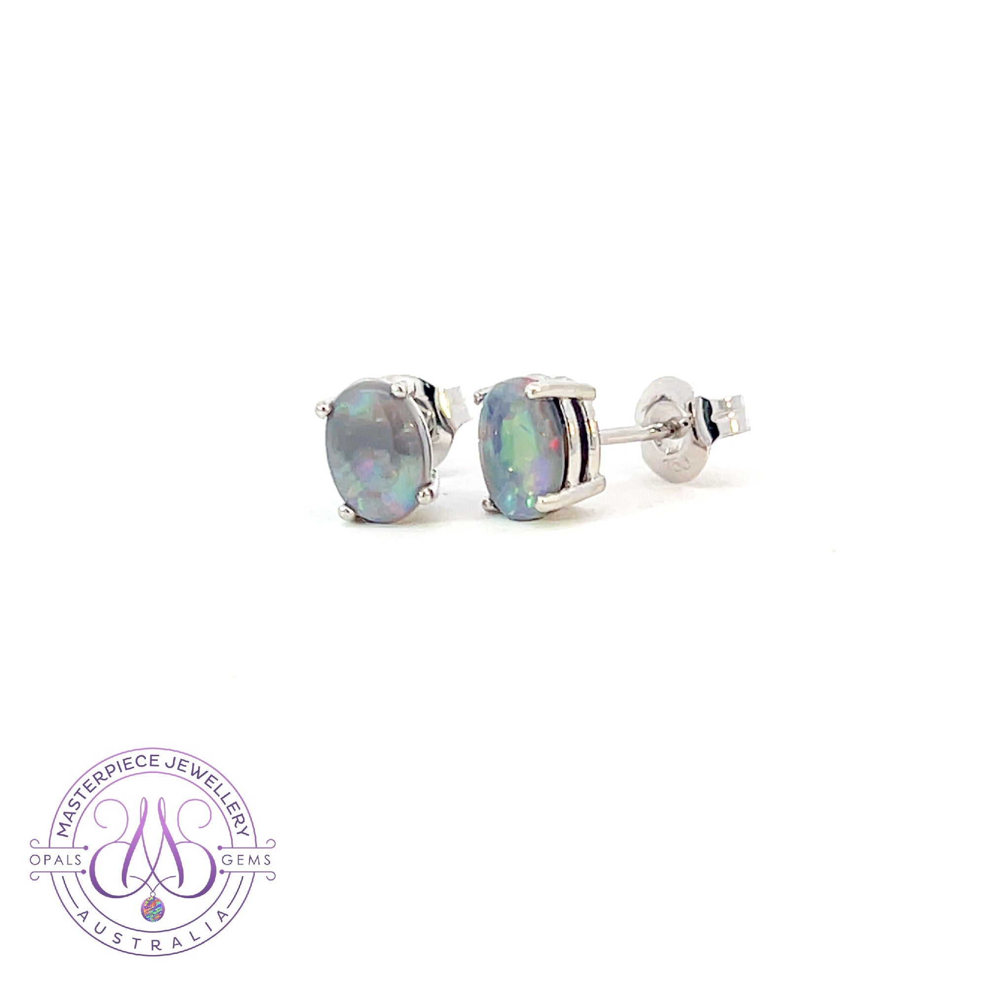 18kt pair of Black Opal Oval 1.16ct studs