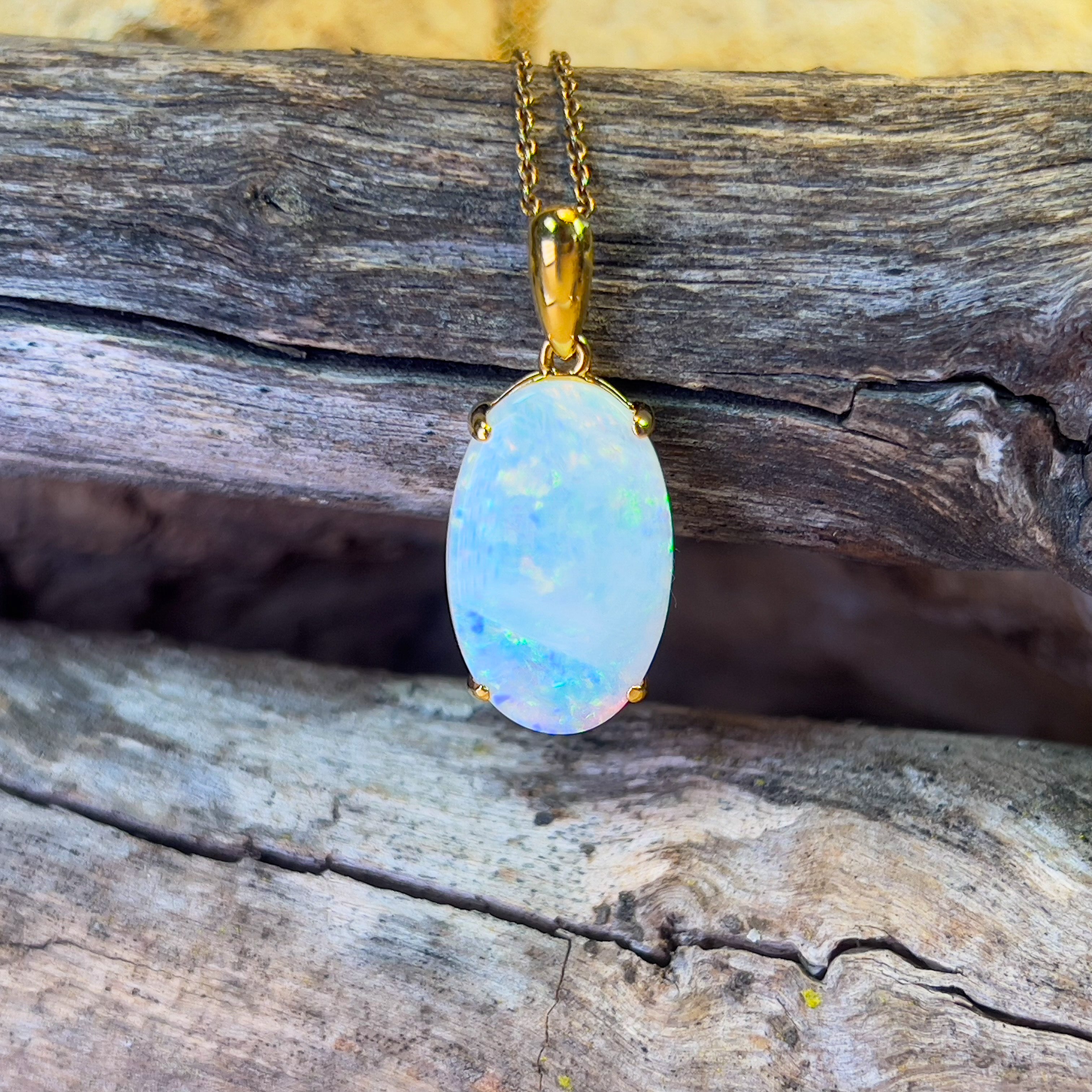 Opal selling claw pendant