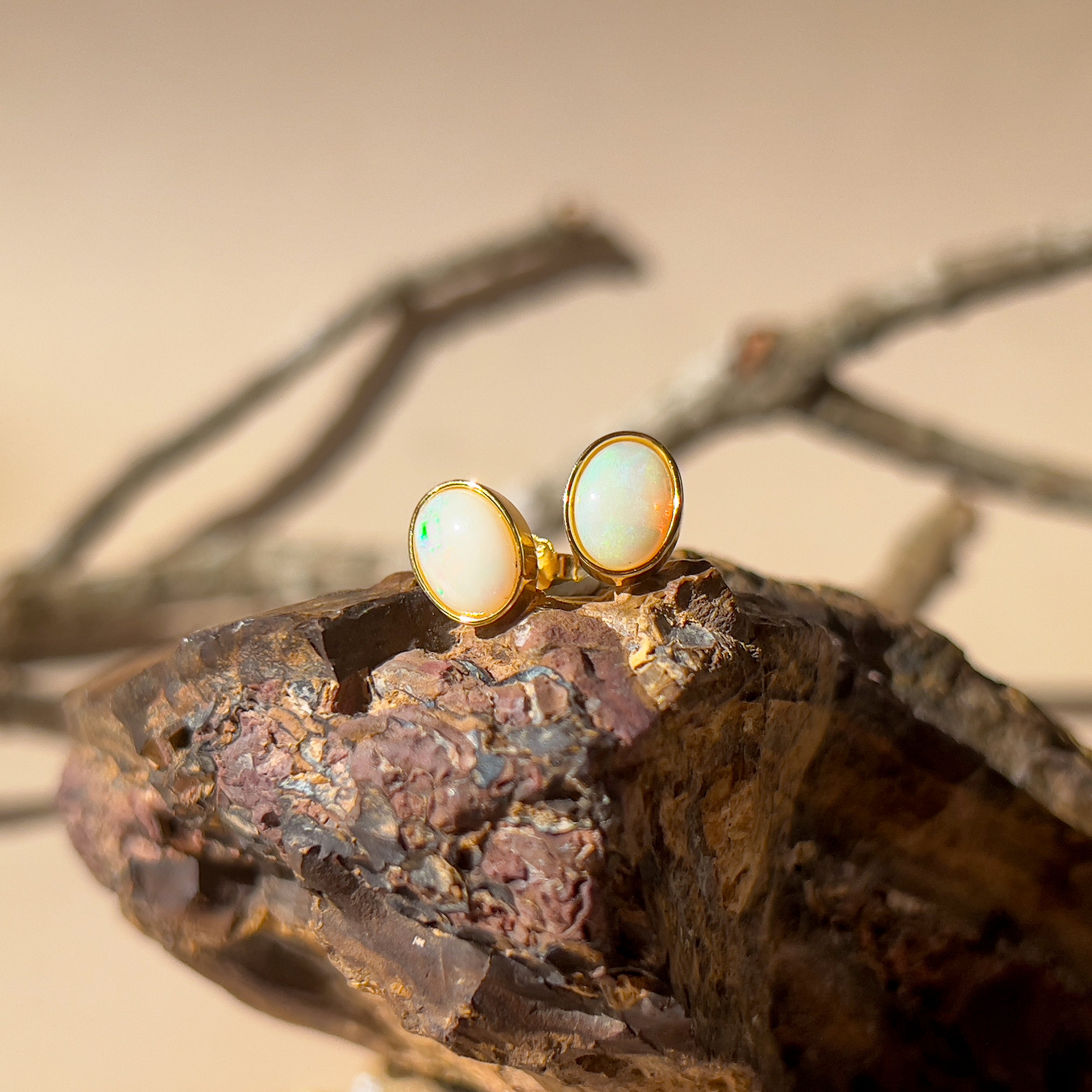 One pair of Gold plated sterling silver 8x6mm White Opal earrings bezel set - Masterpiece Jewellery Opal & Gems Sydney Australia | Online Shop