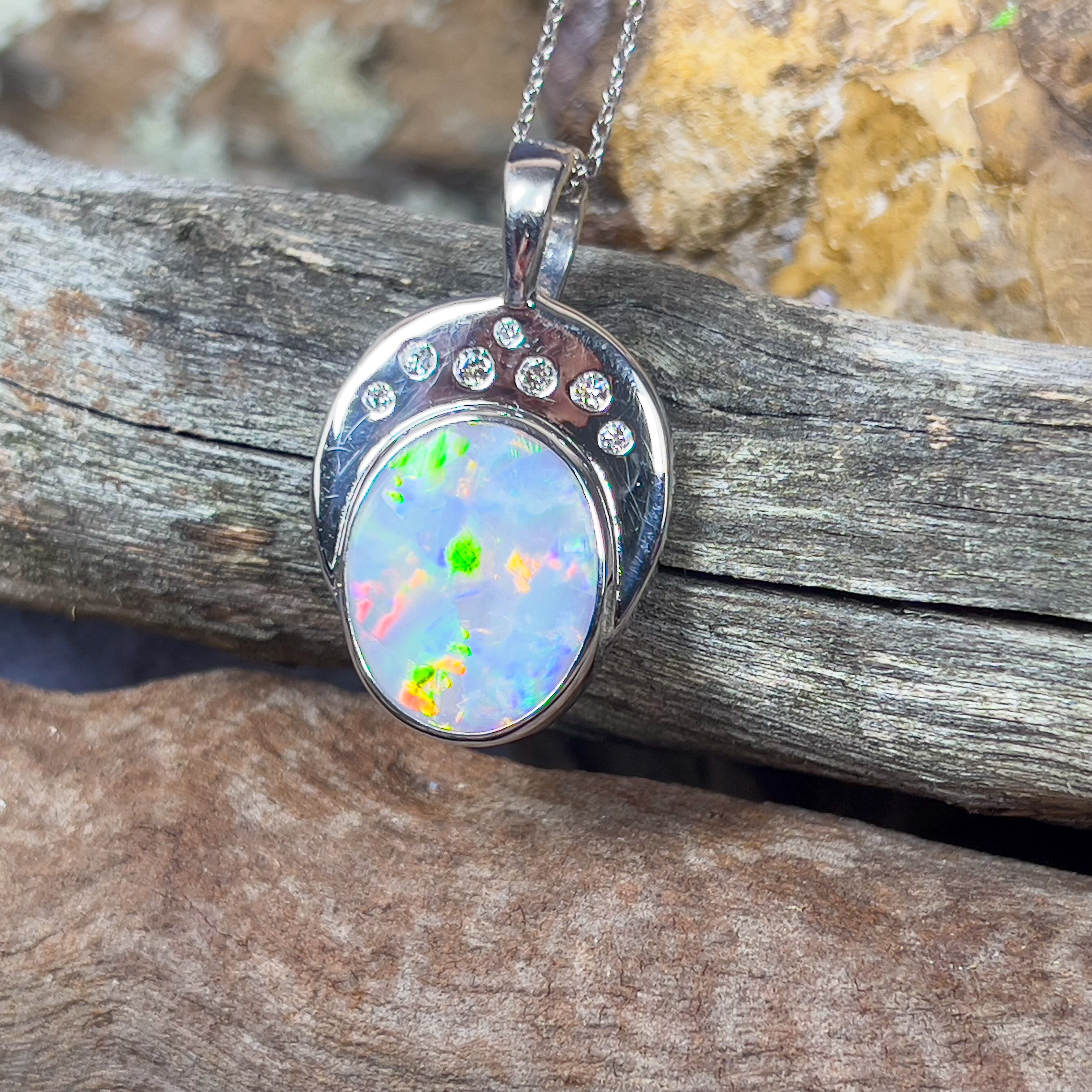 18kt Black Opal Oval 5.8ct and 7 Diamonds pendant enhancer - Masterpiece Jewellery Opal & Gems Sydney Australia | Online Shop