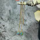 14kt Yellow Gold chain dangling earring with Black Opals 0.9ct - Masterpiece Jewellery Opal & Gems Sydney Australia | Online Shop