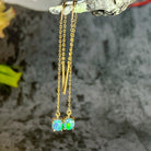 14kt Yellow Gold chain dangling earring with Black Opals 0.9ct - Masterpiece Jewellery Opal & Gems Sydney Australia | Online Shop