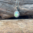 Platinum cluster pendant with one 7x5mm Crystal Opal and Diamond halo - Masterpiece Jewellery Opal & Gems Sydney Australia | Online Shop