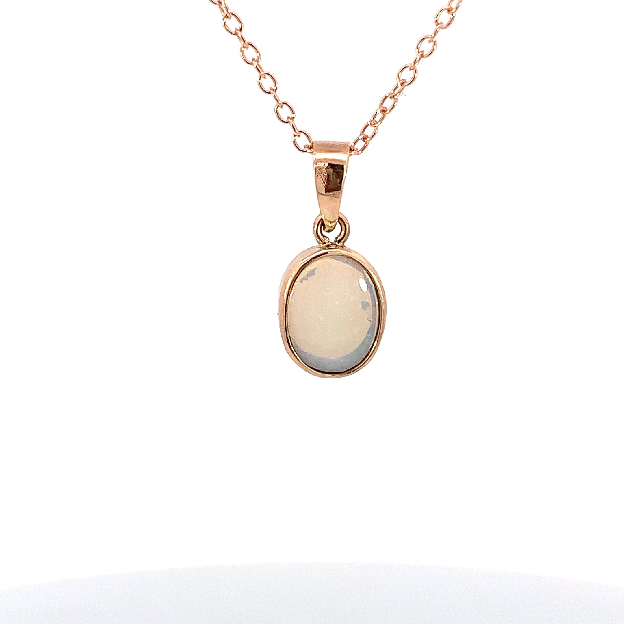 9kt Yellow Gold pendant bezel set with one 8x6mm White Opal - Masterpiece Jewellery Opal & Gems Sydney Australia | Online Shop