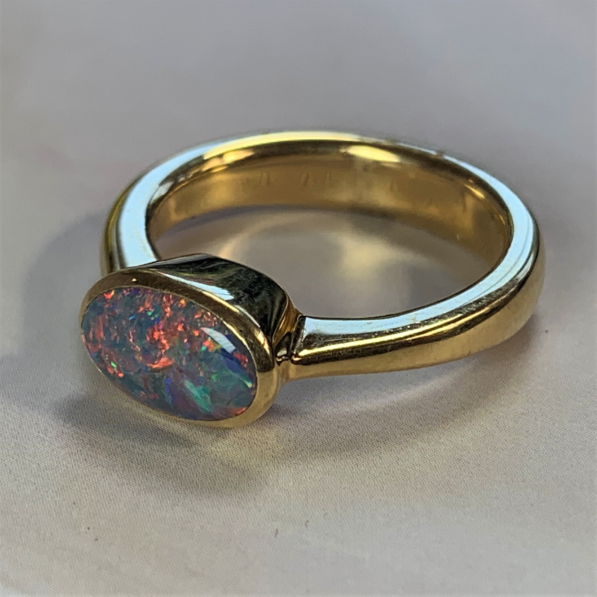 18kt Yellow Gold Black Opal 1.2ct bezel set - Masterpiece Jewellery Opal & Gems Sydney Australia | Online Shop